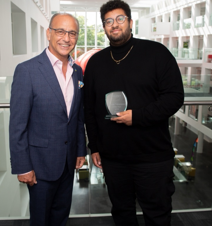 James Gayle receiving the Solent University Graduate Entrepreneur of the Year award from Theo Paphitis
